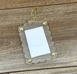 Acrylic Tag-Along Bag Tag, photo 2: clear scalloped acrylic bag tag with a gold ring for a stitched Small DK Unwind canvas